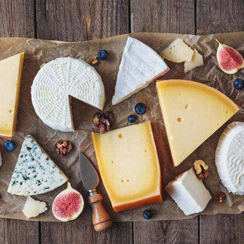 6 month artisan cheese subscription box featuring British and European cheeses with tasting notes
