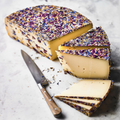 8 Blumen Swiss cheese with edible flowers, an example cheese in the selection