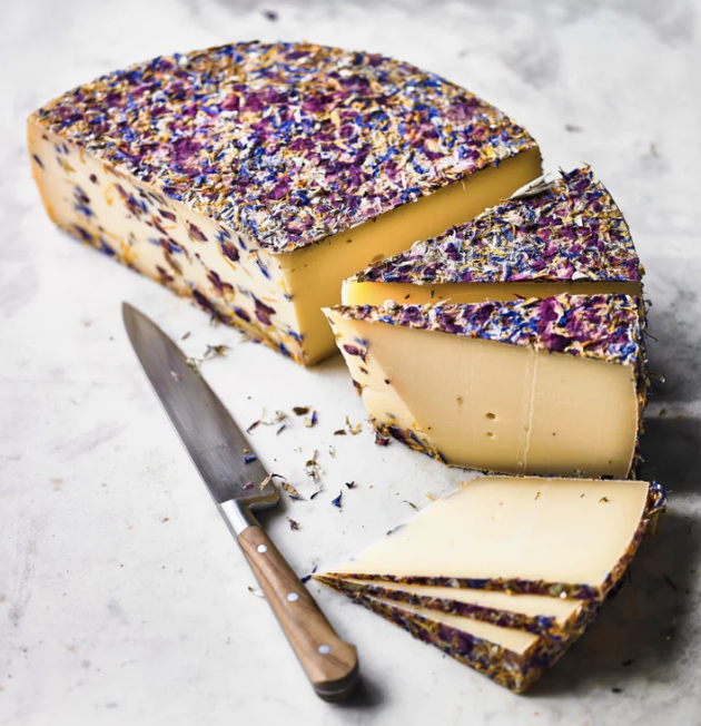 8 Blumen Swiss cheese with edible flowers, an example cheese in the selection